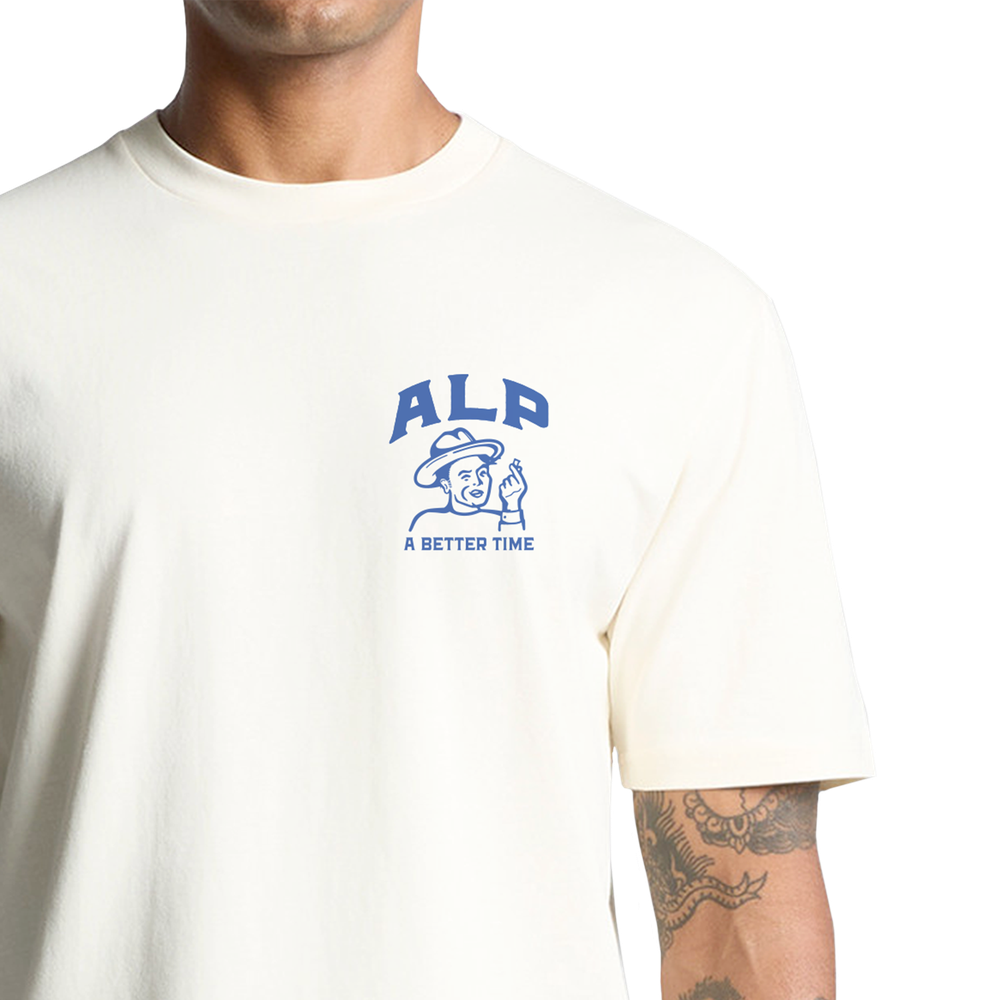 Man wearing an off-white T-shirt featuring the ALP logo and slogan "A Better Time," promoting nicotine pouches.